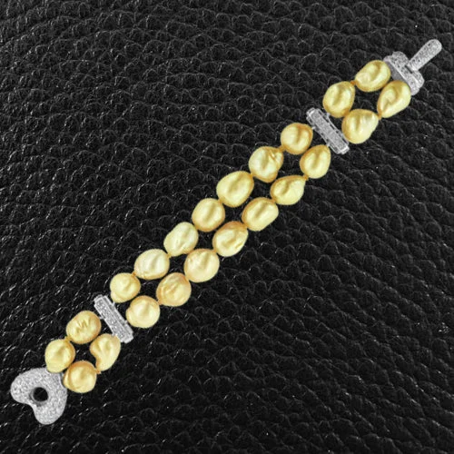 Bracelets With Dark Hues-Golden Pearl & Diamond Bracelet